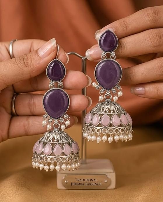 oxidised silver jhumka earrings with purple stones, pink teardrop accents and pearl drops oxidised silver jhumka earrings with purple stones, pink teardrop accents and pearl drops